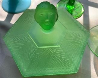 green glass box with face finial