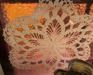 stained glass with doily 