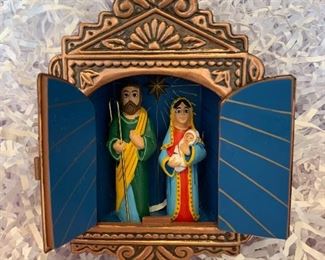 many nativity sets and ornaments