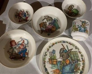 Peter rabbit four piece children’s dinnerware, two pieces Raggedy Ann and Andy child’s bowls