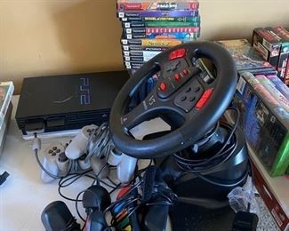 PlayStation 2 game console v3 steering wheel, guitar, controllers, games etc. N/A D966