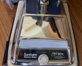 Sanitaire Upright vacuum 46x14x16in HxWxD 19638