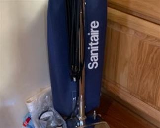Sanitaire Upright vacuum 46x14x16in HxWxD 19638