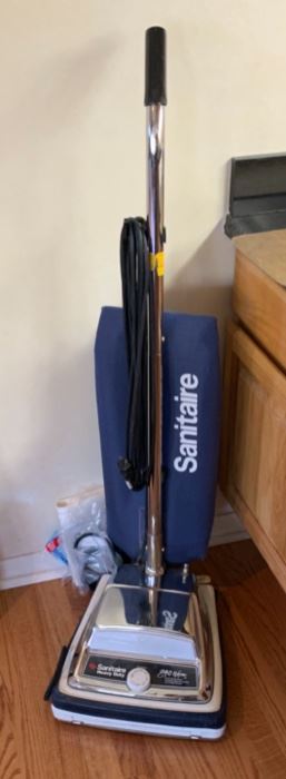 Sanitaire Upright vacuum 46x14x16in HxWxD 19638