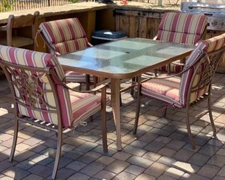 Aluminum Patio Table w/ 4 Chairs	Table: 28x38.5x60.5in long    chair 38x24x28	HxWxD