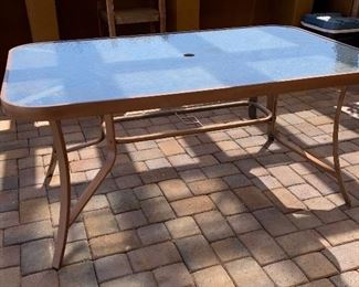 Aluminum Patio Table w/ 4 Chairs	Table: 28x38.5x60.5in long    chair 38x24x28	HxWxD