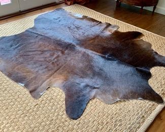 Item 73:  Animal hide rug - 87.5" x 73":  $150