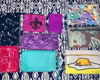 Item 272:  Lot of 9 assorted change purses:  $22