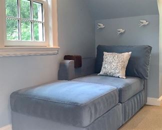 Item 109:  LoveSac with two seats and two sides plus a drink holder - this converts easily into a twin size guest bed - 77"l x 42"w x 31"h:  $650