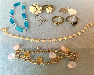 Item 276:  Lot of (3) bracelets and (5) rings:  $16