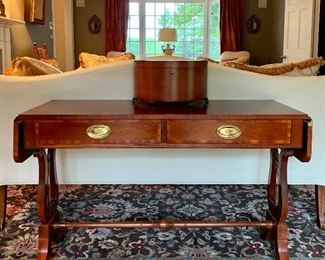 Item 75:  Baker Furniture "Harp" sofa table - $445                                      Open - 58"l x 16"w x 28"h                                                                                    Closed - 44"l x 16"w x 28"h