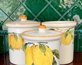 Item 130:  (2) Lemon canisters with lids and (1) utensil holder:  $60