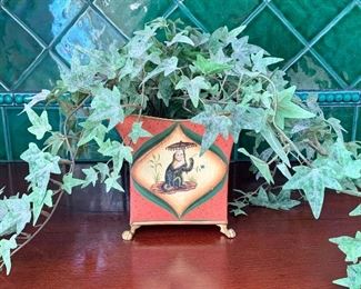 Item 386:  Topiary in a monkey planter:  $14