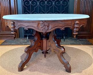 Item 175:  Antique Marble top Eastlake tea table - 35.25"l x 26"w x 21"h:  $185