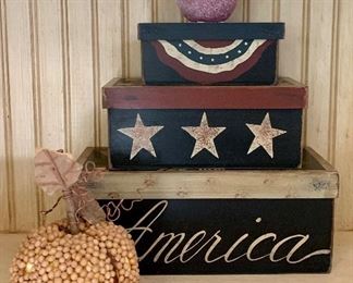 Item 243:  (3) America boxes, (1) apple and (1) pumpkin:                                                                      Tallest - 4.75"$24.00