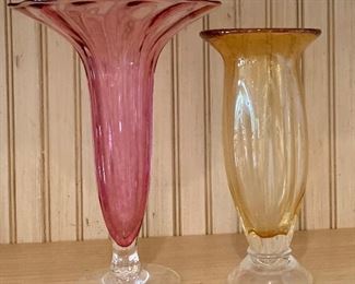 Item 254:  Two hand blown glass vases:                                                      Red - 11"                                                                                                                     Yellow - 9.75........$28.00