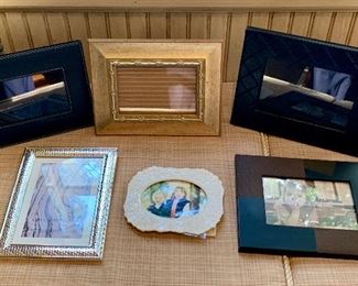 Item 304:  Lot of (6) picture frames with one silver frame:    $25  