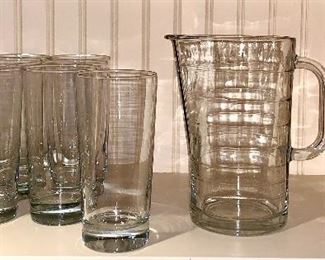 Item 305:  Lot of glasses and two pitchers:  $24
