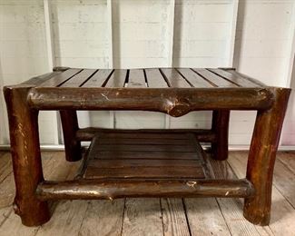 Item 409:  Rustic coffee table- heavy wood - 33.25"l x 22.5"w x 18"h: $95 