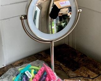 Item 417:  Lighted vanity mirror and toe separators:  $15