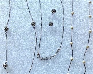 Two necklaces - one with rhinestone balls and matching earrings and the other with pearls: $25