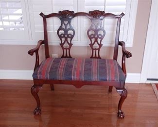 Mahogany Chippendale upholstered loveseat