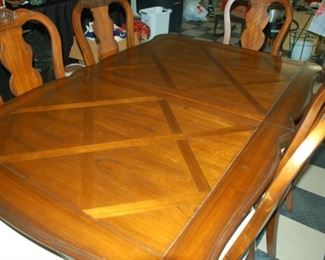 Herman dining room table with 6 chairs and two leafs