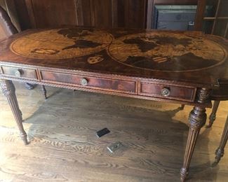 Inlaid World Map Mahogany Desk
Maitland Smith 
72" W x 39" D x 30.5" H
