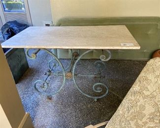 Marble and metal based antique pattisserie table $1600 it measures 52" x 28" x 30.  Marble is in great shape normal for its age