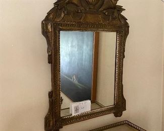 Antique mirror with carved floral basket detail $680