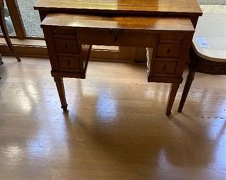 Antique Writing Desk with leather inlay and pullout shelf as well as drawers  $1200 measures 20.25"d x 31"w x 29.75"