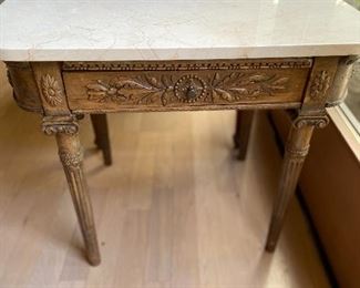 close up of side of the side table with drawer 