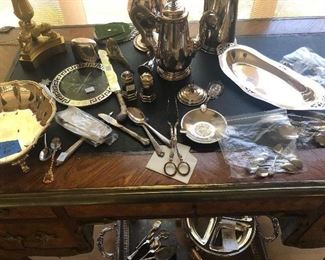 top of the desk - all of the sterling and silver plate will  be available only for the on-site sale the 12th