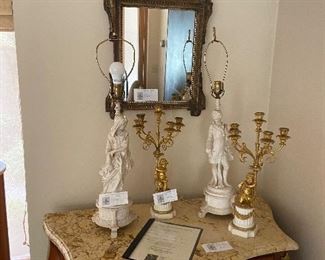 mirror sold on prior photo, bombe chest in next photo, fire gilded brass and marble antique cherub candlelabra are $6000 or best offer.  