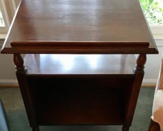 Tilt top display table