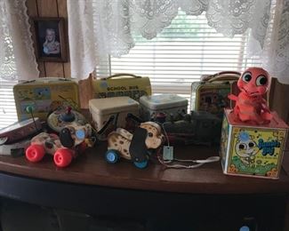 Vintage lunch boxes and toys