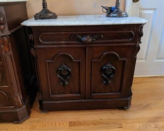 Marble topped nightstand