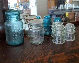 Insulators and glass topped jars