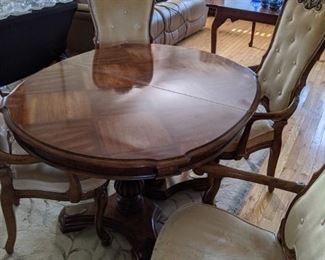 Pedestal table with chairs