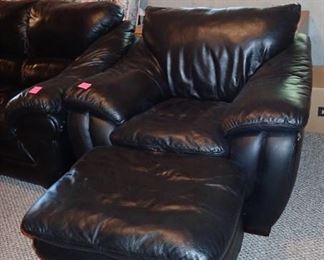 BLACK LEATHER CHAIR AND OTTOMAN