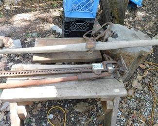 Two man logging tongs, jack, wooden bench