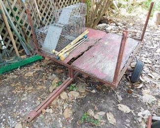 small trailer, pull behind lawn mower, animal traps