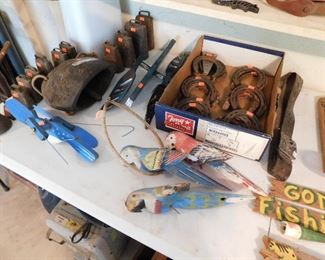 Cow bell collection, one is very old carved wood, horse shoes, folk art parrots