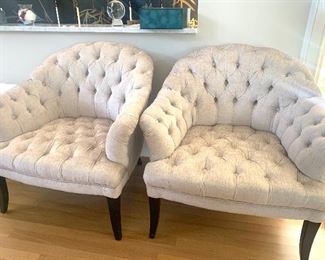 Pair of matching tufted chesterfield style chairs