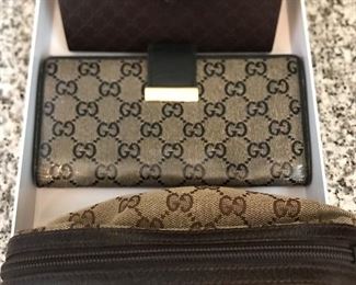 Gucci sunglasses, wallet, cosmetic pouch.