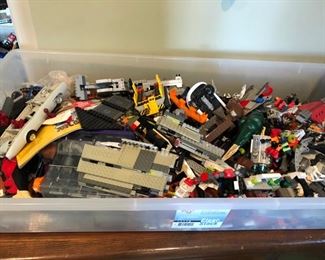 Tons of Legos, sets that have been assembled as well as loose pieces 