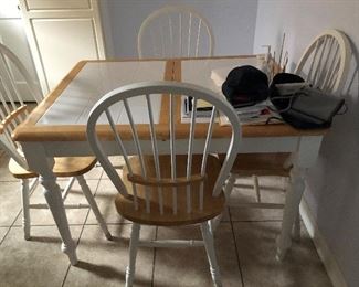 Table and 4 chairs. 75.00