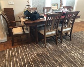 Solid oak dining table and 6 chairs (2 arm chairs)