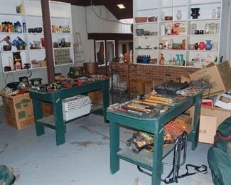 Garage is full of tools, planters and such