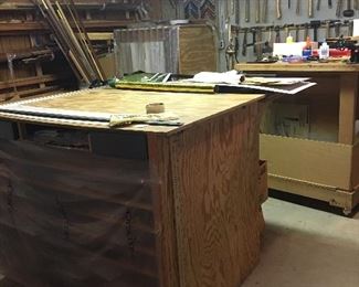 cutting table, framing mats, glass, frames, and tools from custom framing business. 